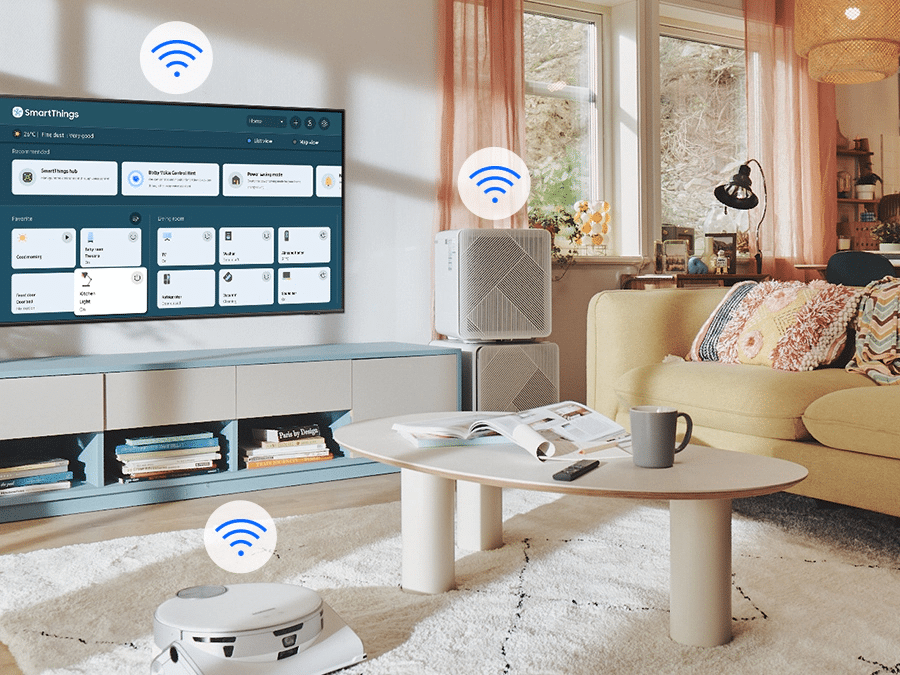 На екрані телевізора з’явиться меню SmartThings.  Над телевізором, самохідним пилососом і очищувачем повітря показані піктограми WiFi.  Q80BATXXH