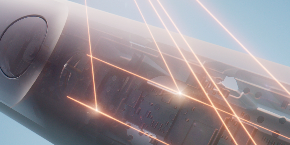 Крупний план внутрішньої частини зубної щітки Philips зі світловими ефектами, що символізують звукову технологію.