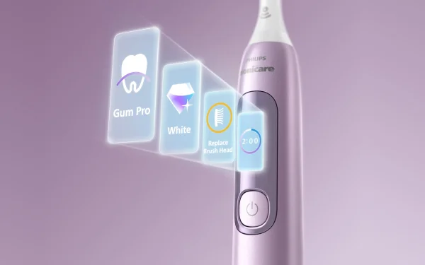 Рожева зубна щітка Philips Sonicare з голограмними режимами: Gum Pro, White, Replace Head та таймер 2:00