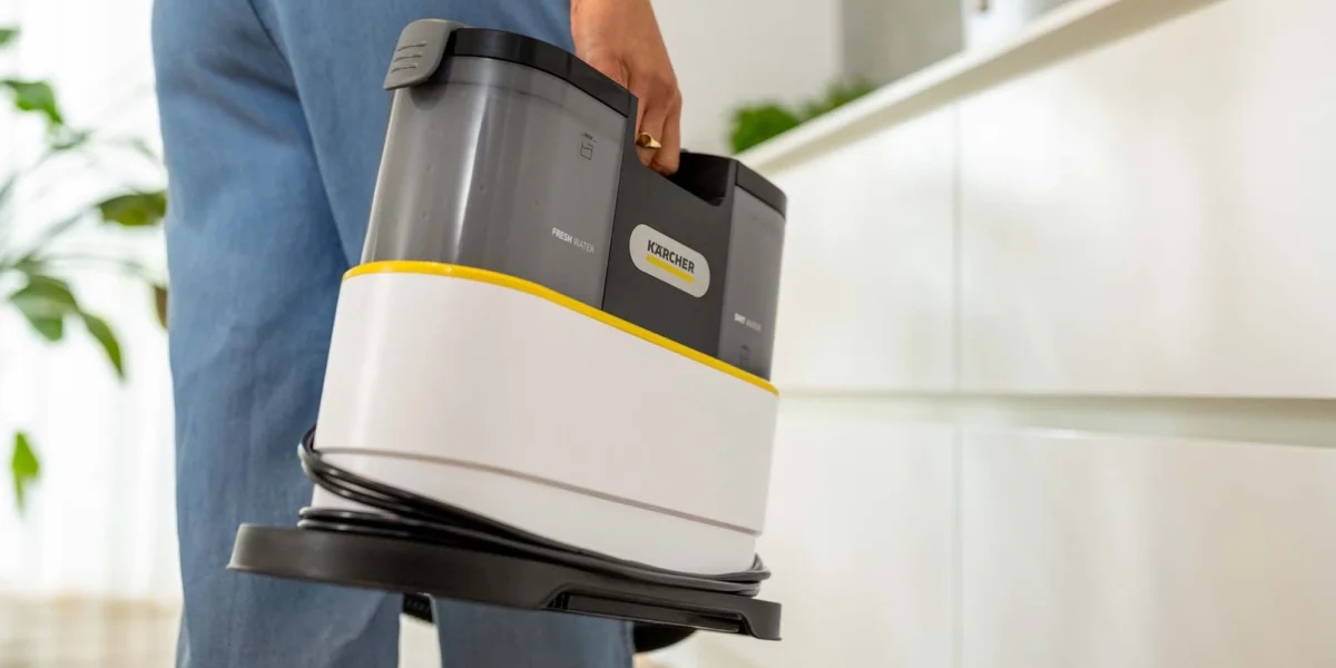 Крупний план пилососа Karcher SE 2 Spot, який переносять за ручку